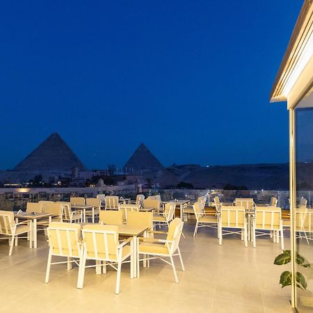 Gaia Pyramids Hotel Kafrat al Jabal Bagian luar foto