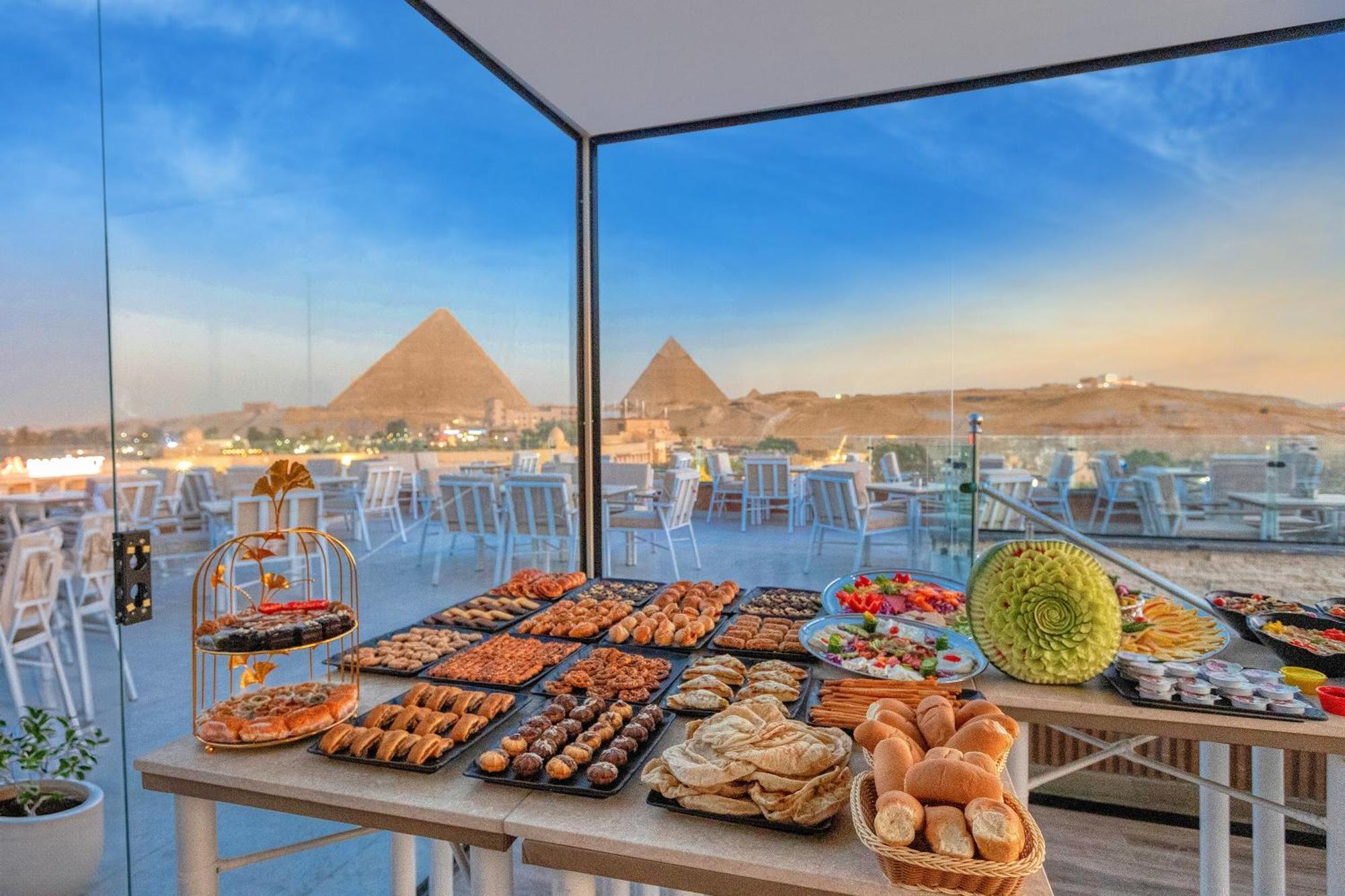 Gaia Pyramids Hotel Kafrat al Jabal Bagian luar foto