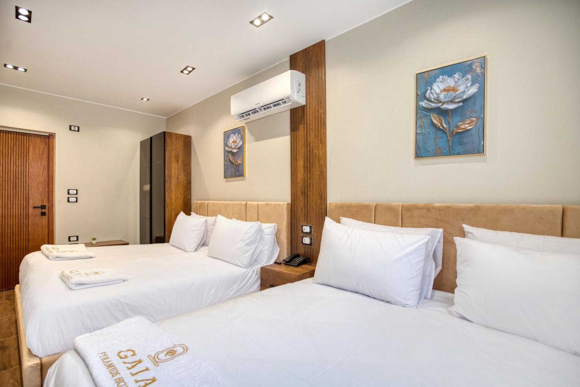 Gaia Pyramids Hotel Kafrat al Jabal Bagian luar foto