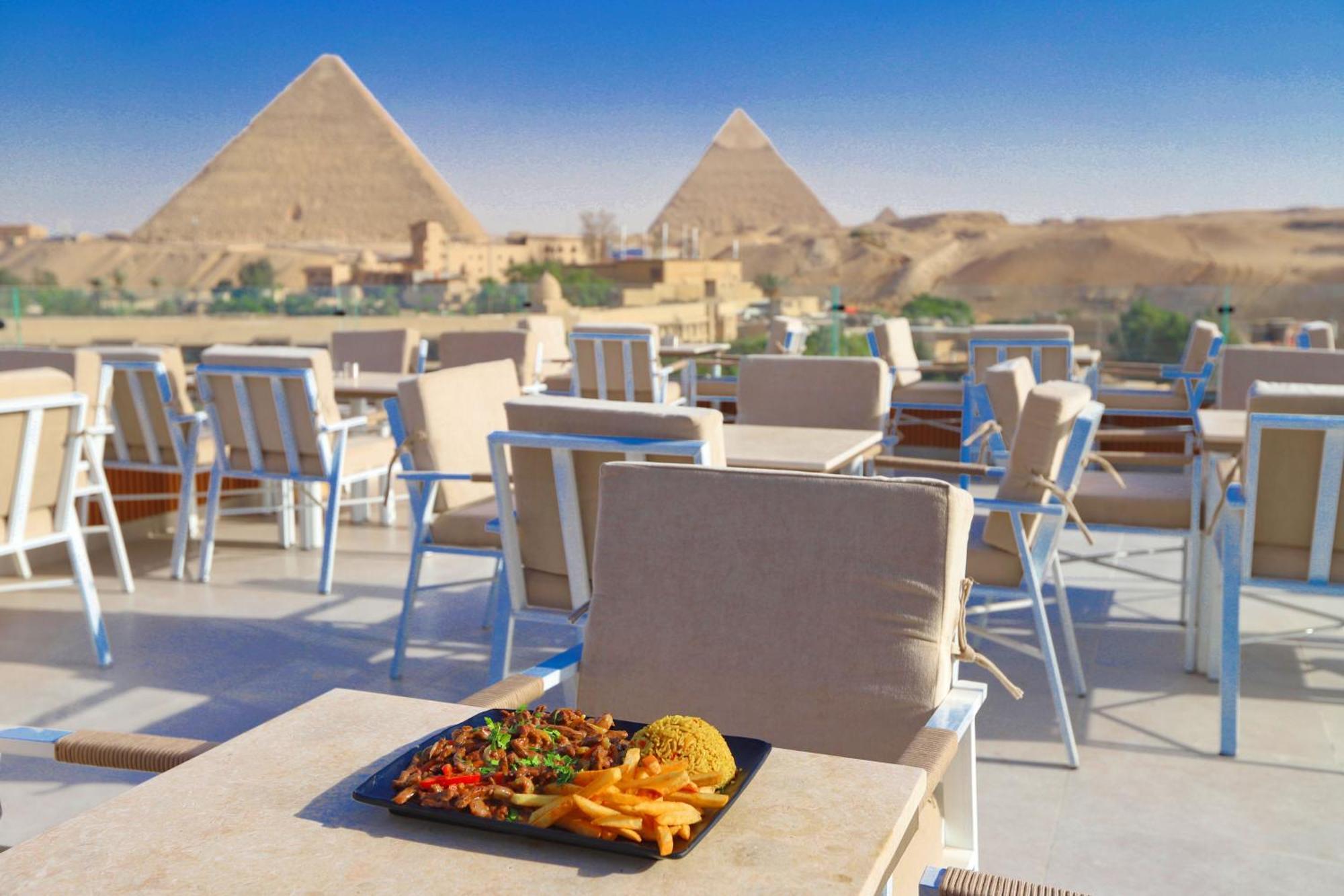 Gaia Pyramids Hotel Kafrat al Jabal Bagian luar foto