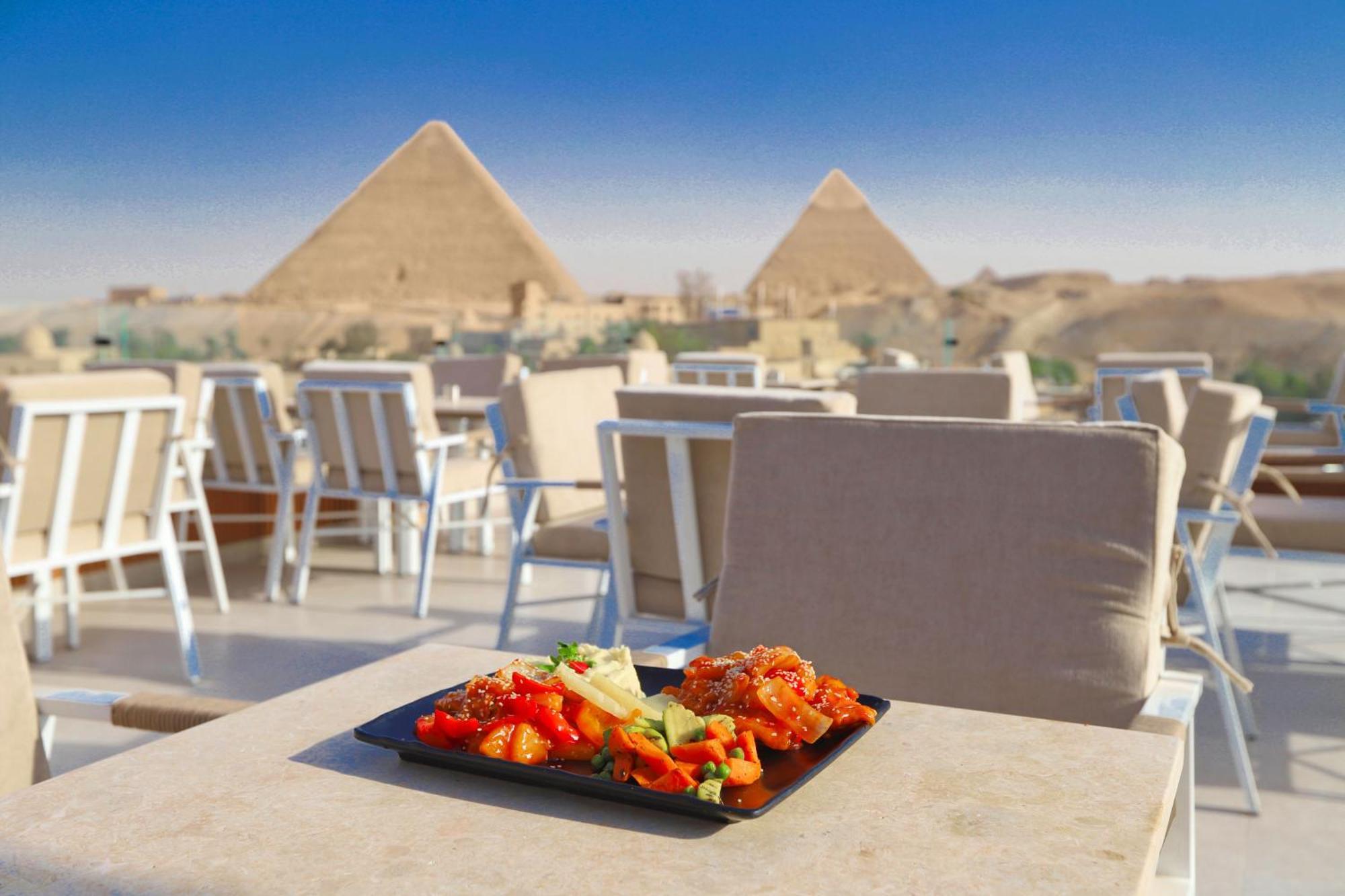 Gaia Pyramids Hotel Kafrat al Jabal Bagian luar foto