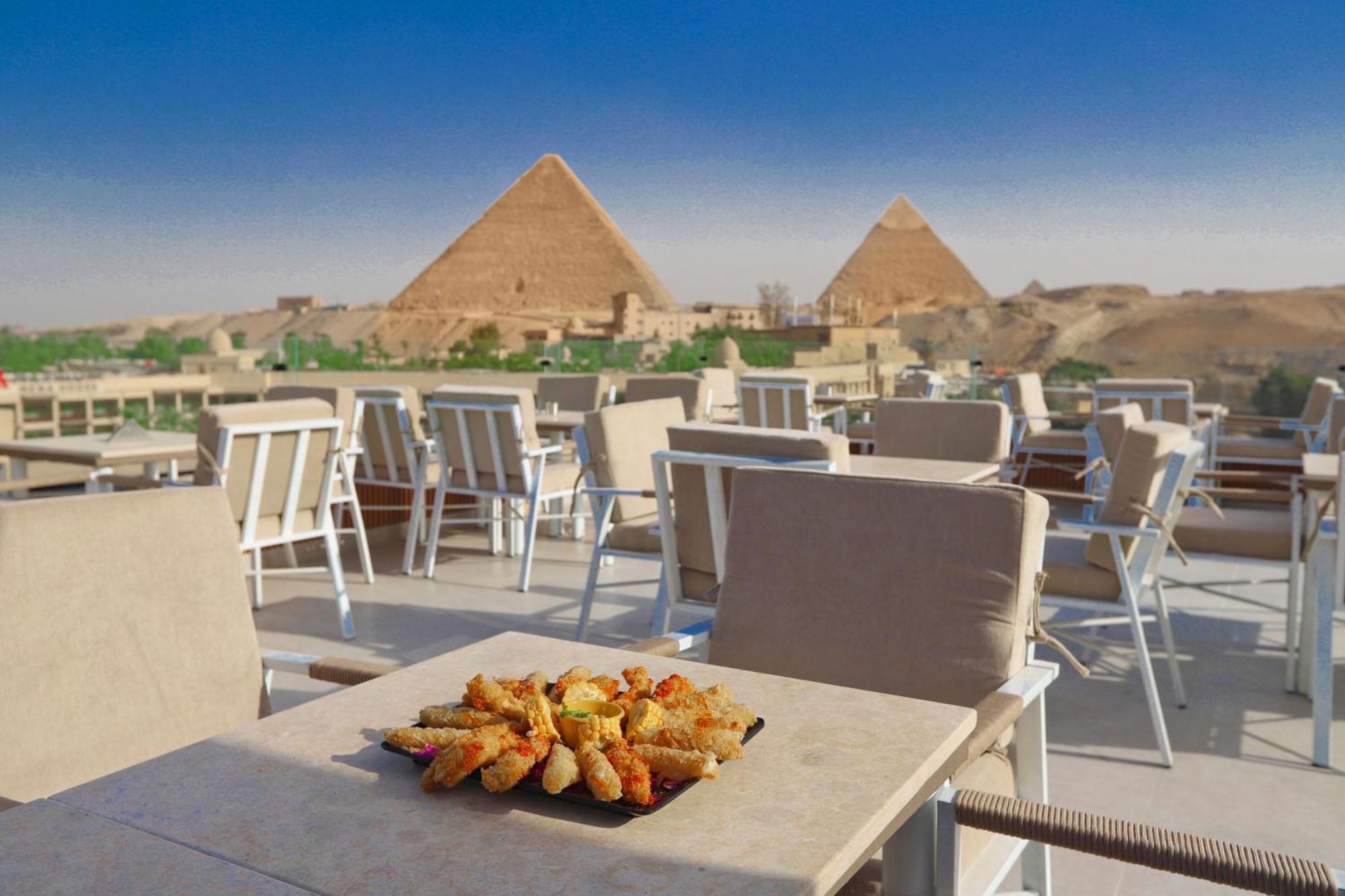 Gaia Pyramids Hotel Kafrat al Jabal Bagian luar foto