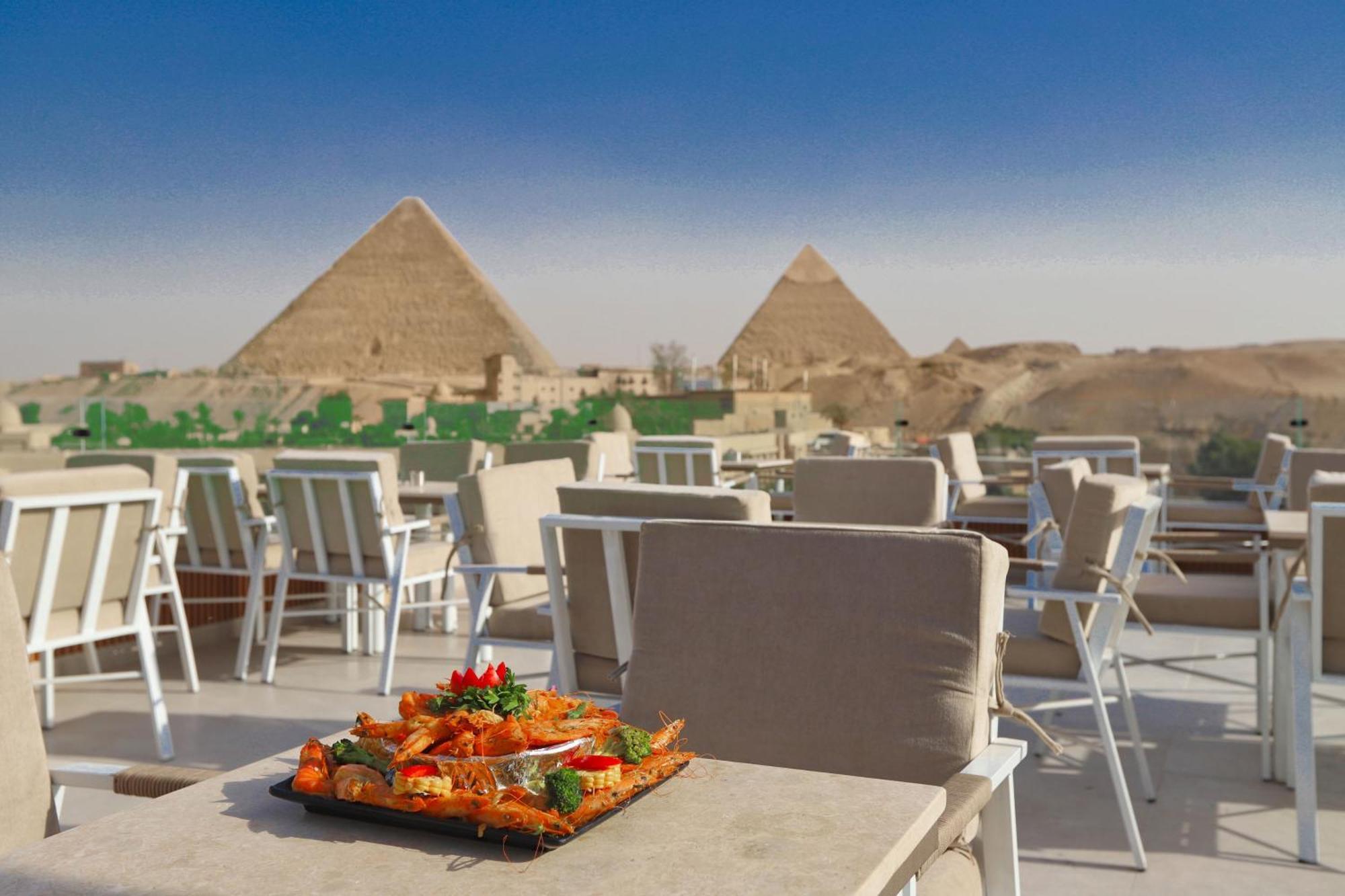 Gaia Pyramids Hotel Kafrat al Jabal Bagian luar foto