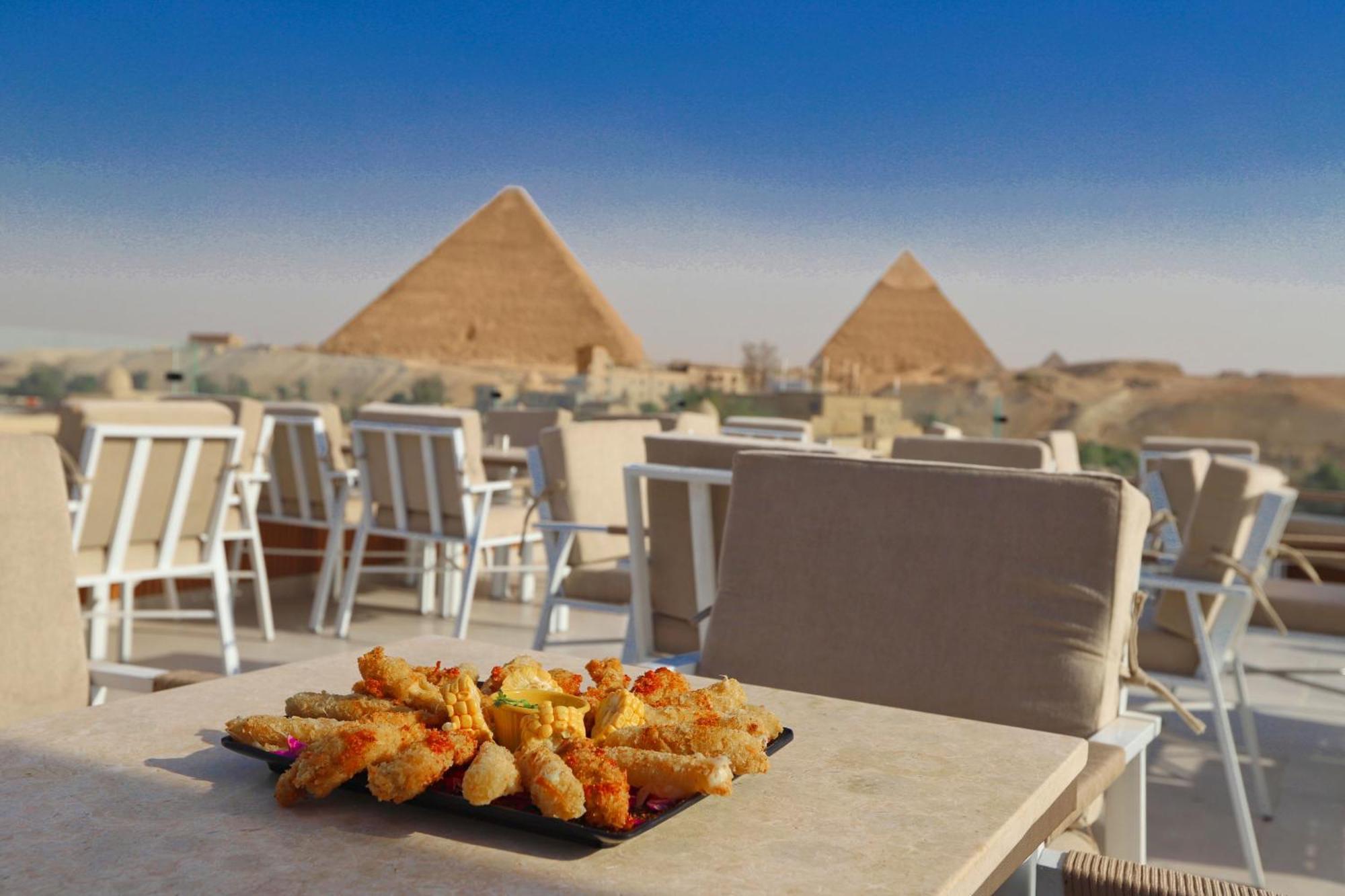 Gaia Pyramids Hotel Kafrat al Jabal Bagian luar foto
