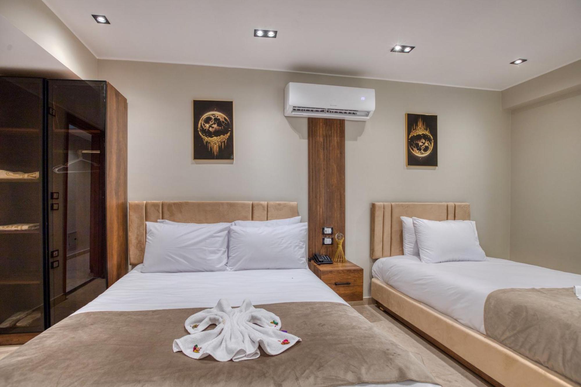 Gaia Pyramids Hotel Kafrat al Jabal Bagian luar foto