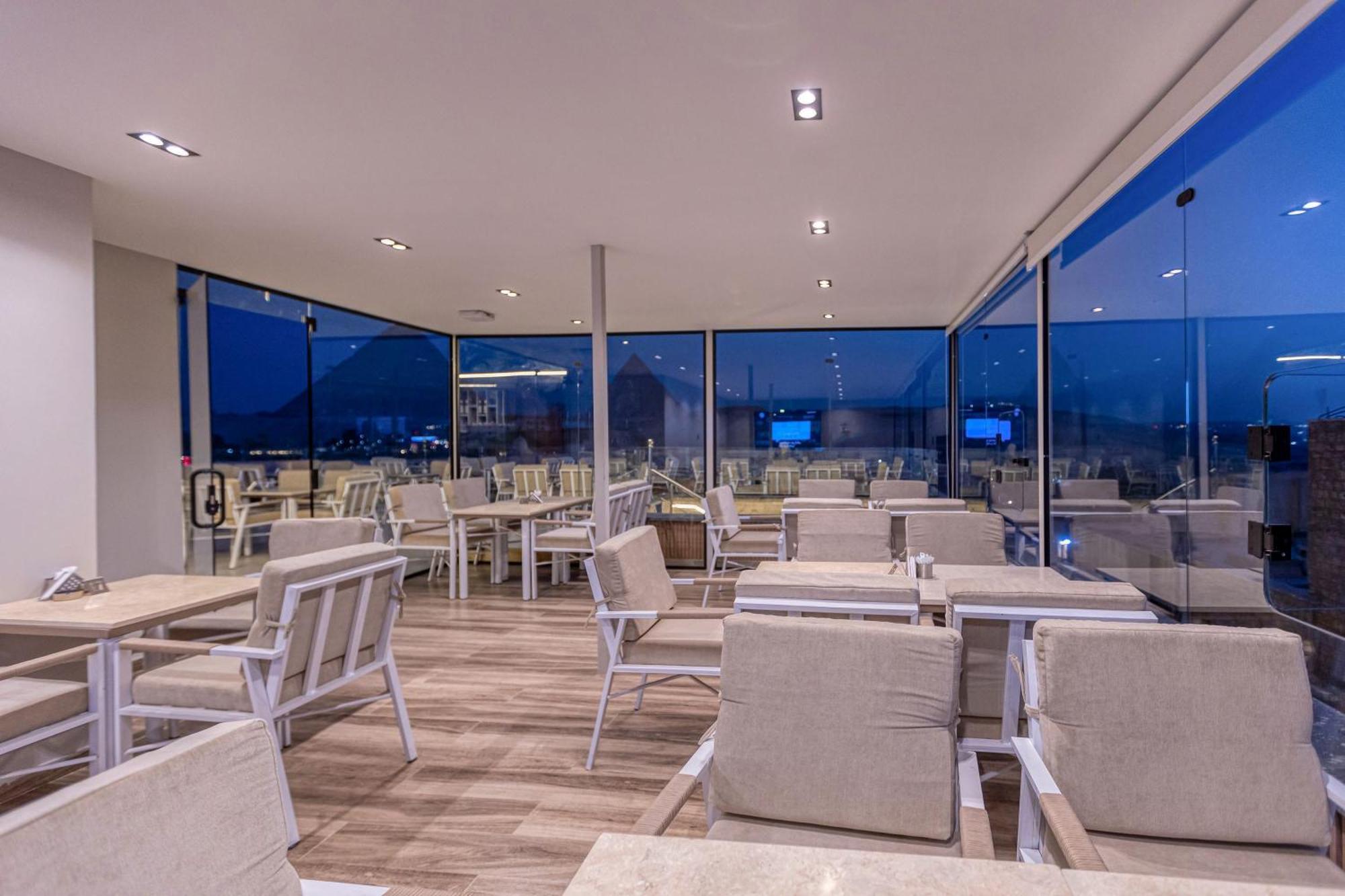 Gaia Pyramids Hotel Kafrat al Jabal Bagian luar foto
